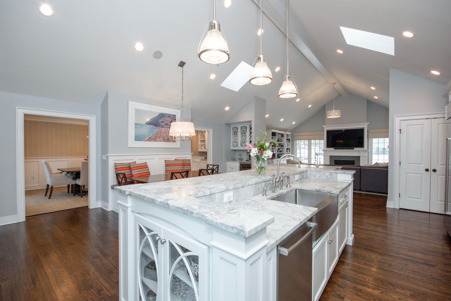 14 Deerfield Road Darien, CT 06820 - Photo 17 of 55 a kitchen with kitchen island granite countertop a stove and a wooden floor