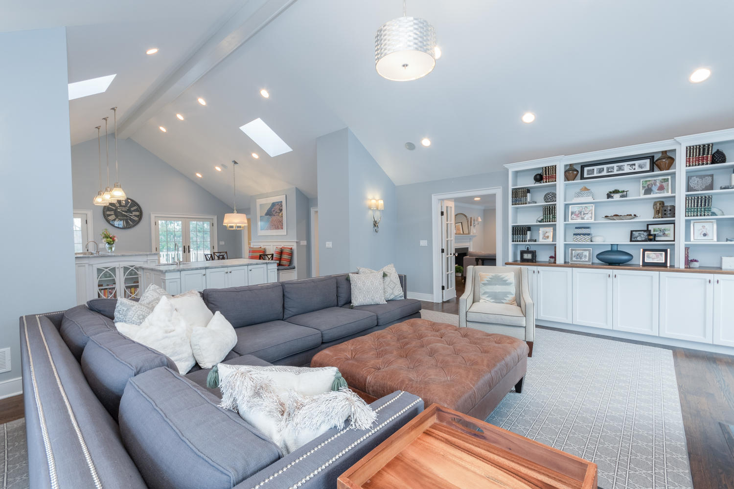 14 Deerfield Road Darien, CT 06820 - Photo 21 of 55 a living room with furniture and a book shelf