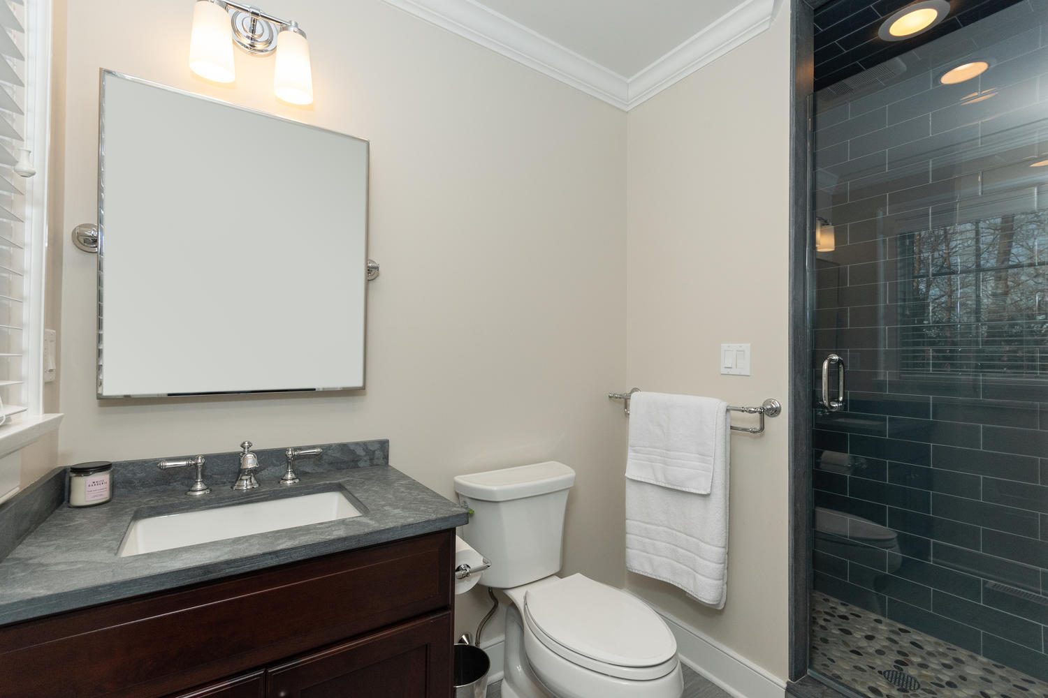 14 Deerfield Road Darien, CT 06820 - Photo 25 of 55 a bathroom with a granite countertop sink toilet and shower