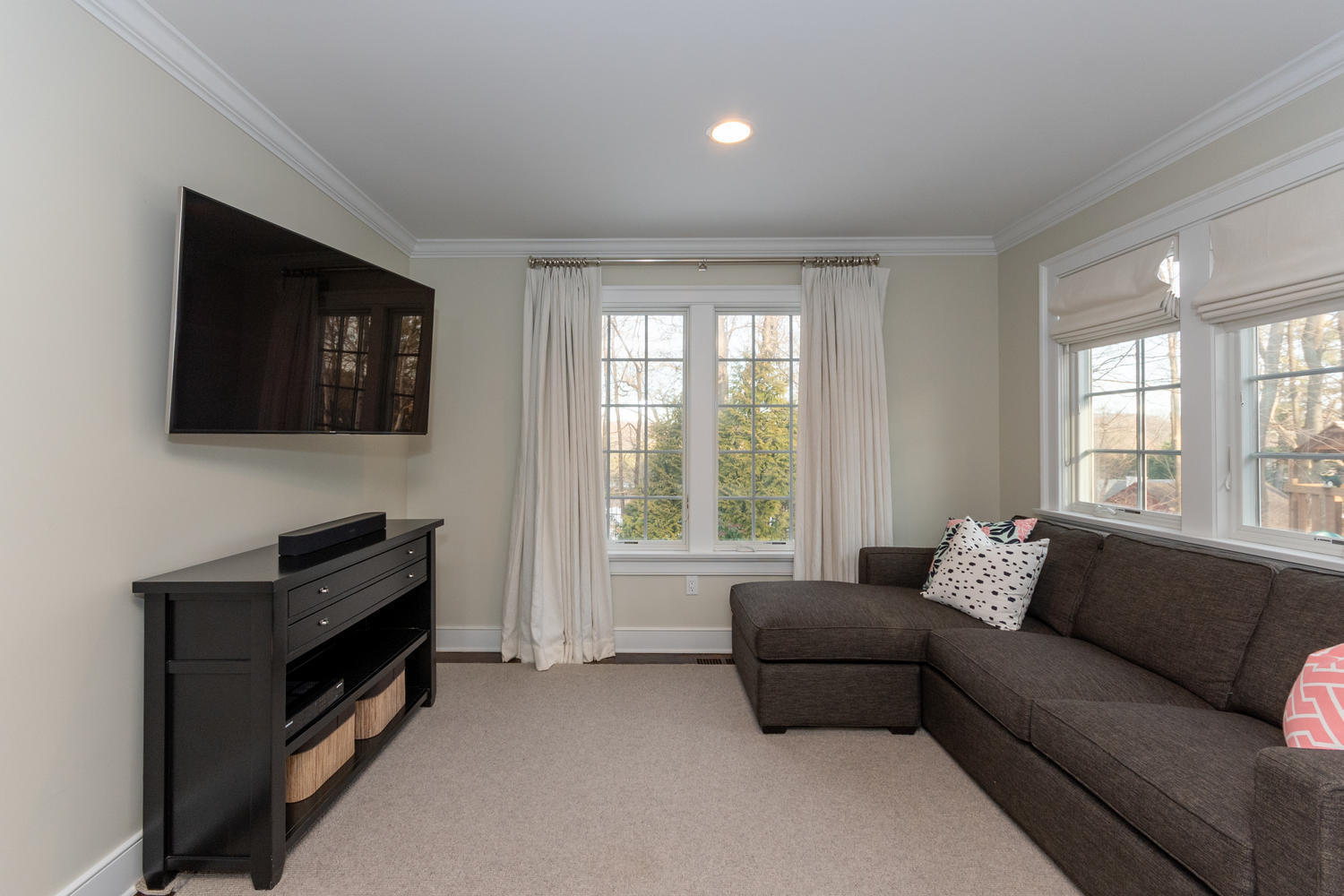 14 Deerfield Road Darien, CT 06820 - Photo 28 of 55 a living room with furniture and a flat screen tv