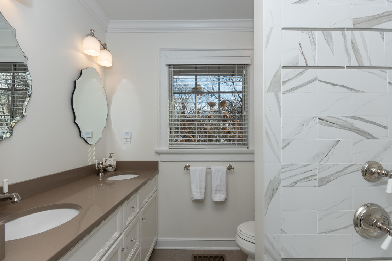 14 Deerfield Road Darien, CT 06820 - Photo 33 of 55 a bathroom with a granite countertop sink and a mirror