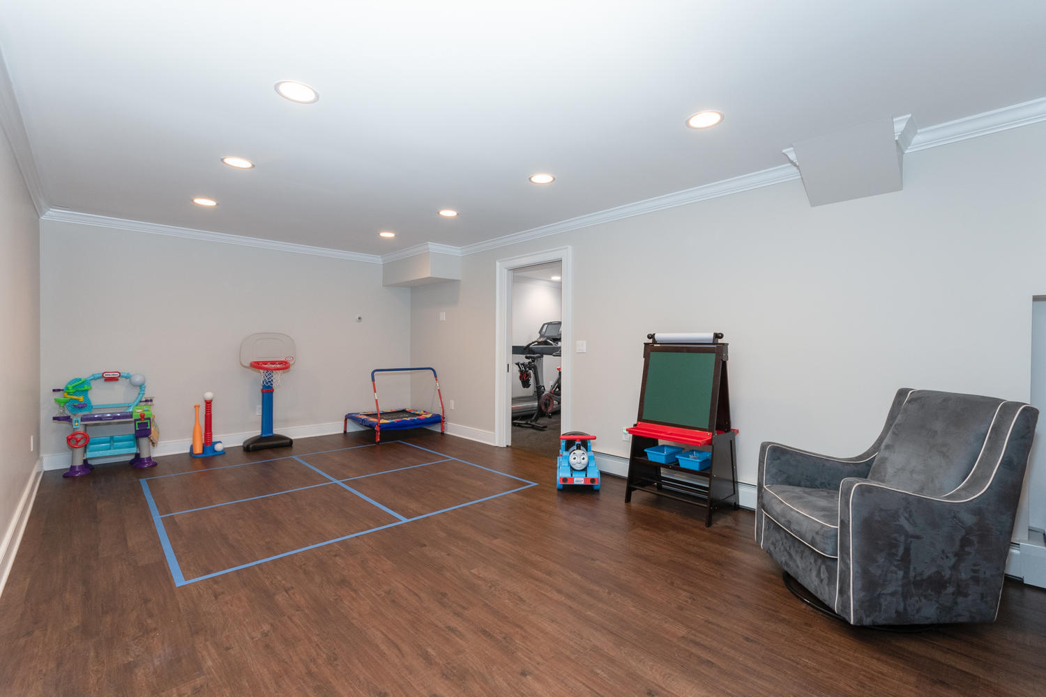 14 Deerfield Road Darien, CT 06820 - Photo 43 of 55 a living room with furniture and a flat screen tv