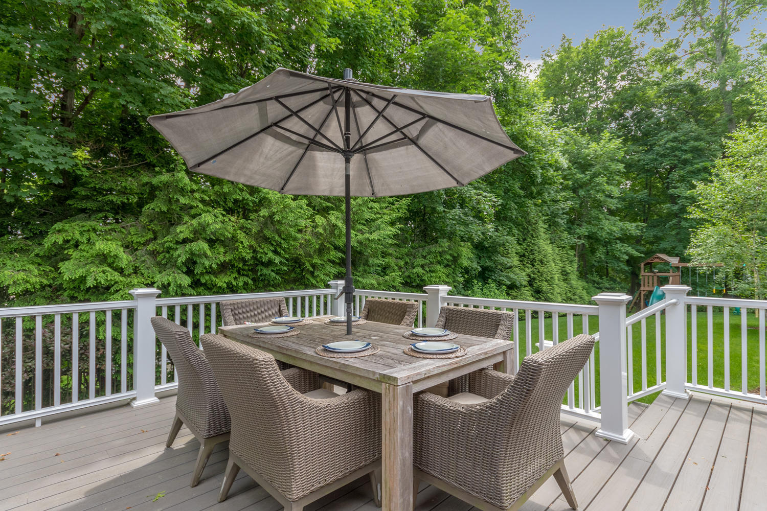 14 Deerfield Road Darien, CT 06820 - Photo 45 of 55 a view of balcony with furniture and umbrella