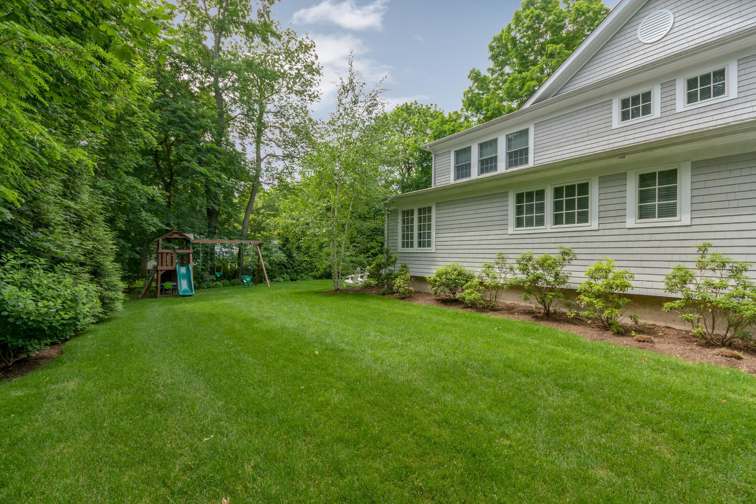 14 Deerfield Road Darien, CT 06820 - Photo 49 of 55 a front view of house with yard and green space