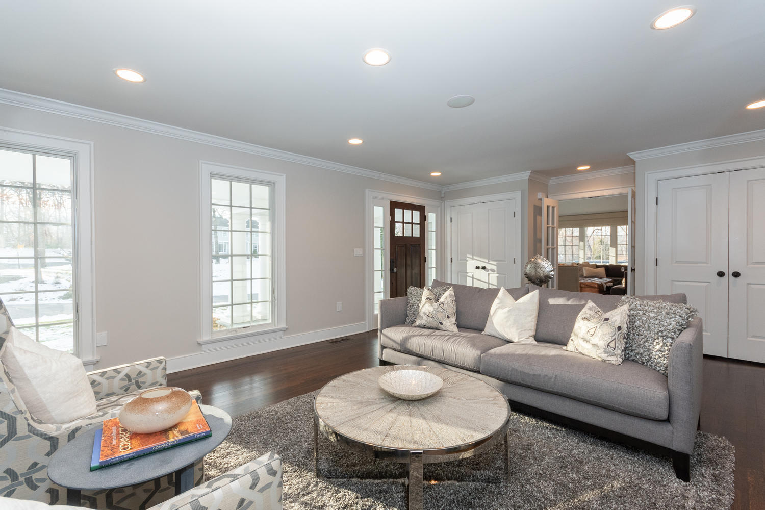 14 Deerfield Road Darien, CT 06820 - Photo 7 of 55 a living room with furniture and a table