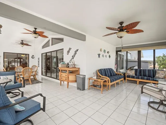 a bedroom with a large bed and a dresser