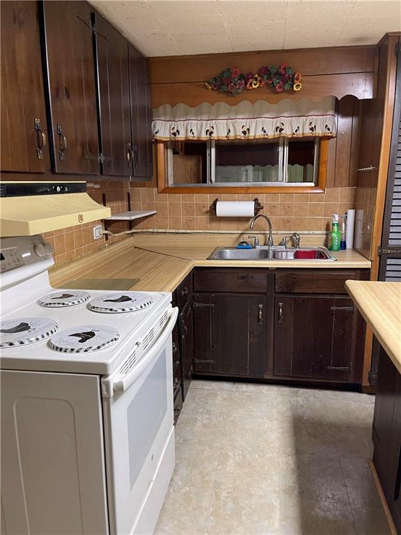 291 Dutch Glory Road Amity, PA 15311 - Photo 14 of 25 a kitchen with a sink and cabinets
