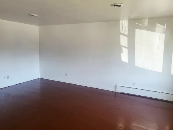 an empty room with an entryway