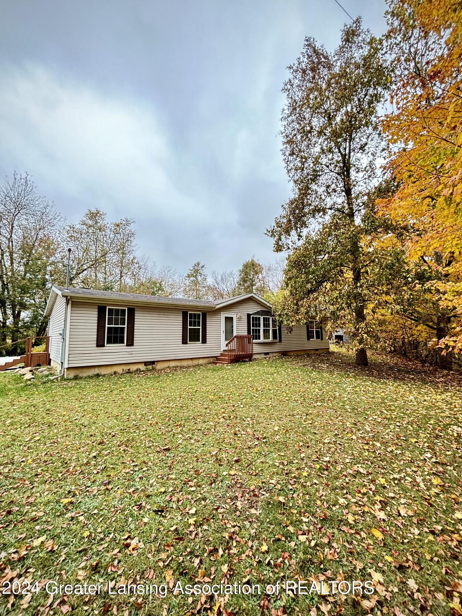 212 Bennett Road Quincy, MI 49082 - Photo 1 of 32 front
