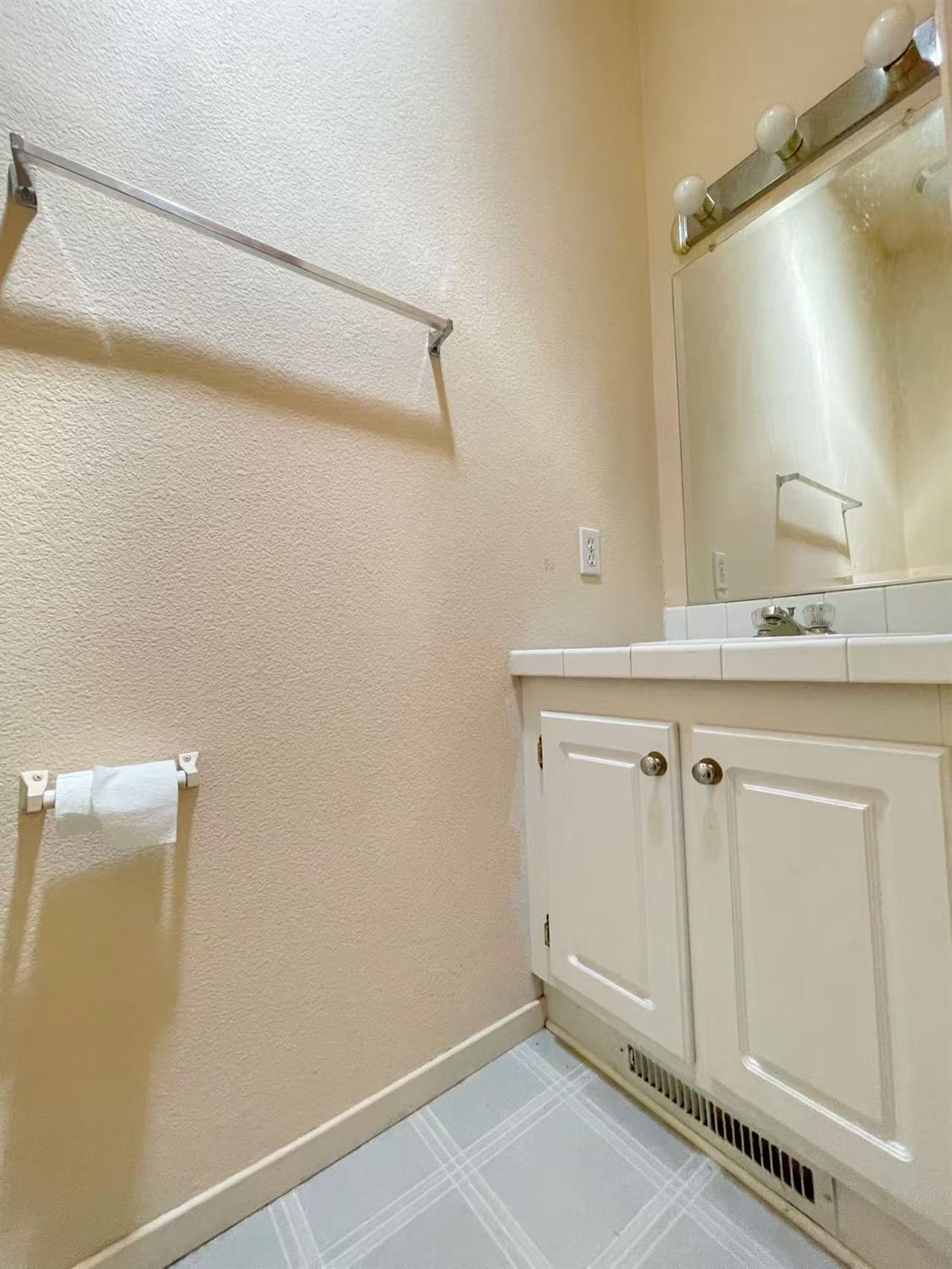112 Renegade Road Oroville, CA 95966 - Photo 15 of 38 a bathroom with a sink and vanity