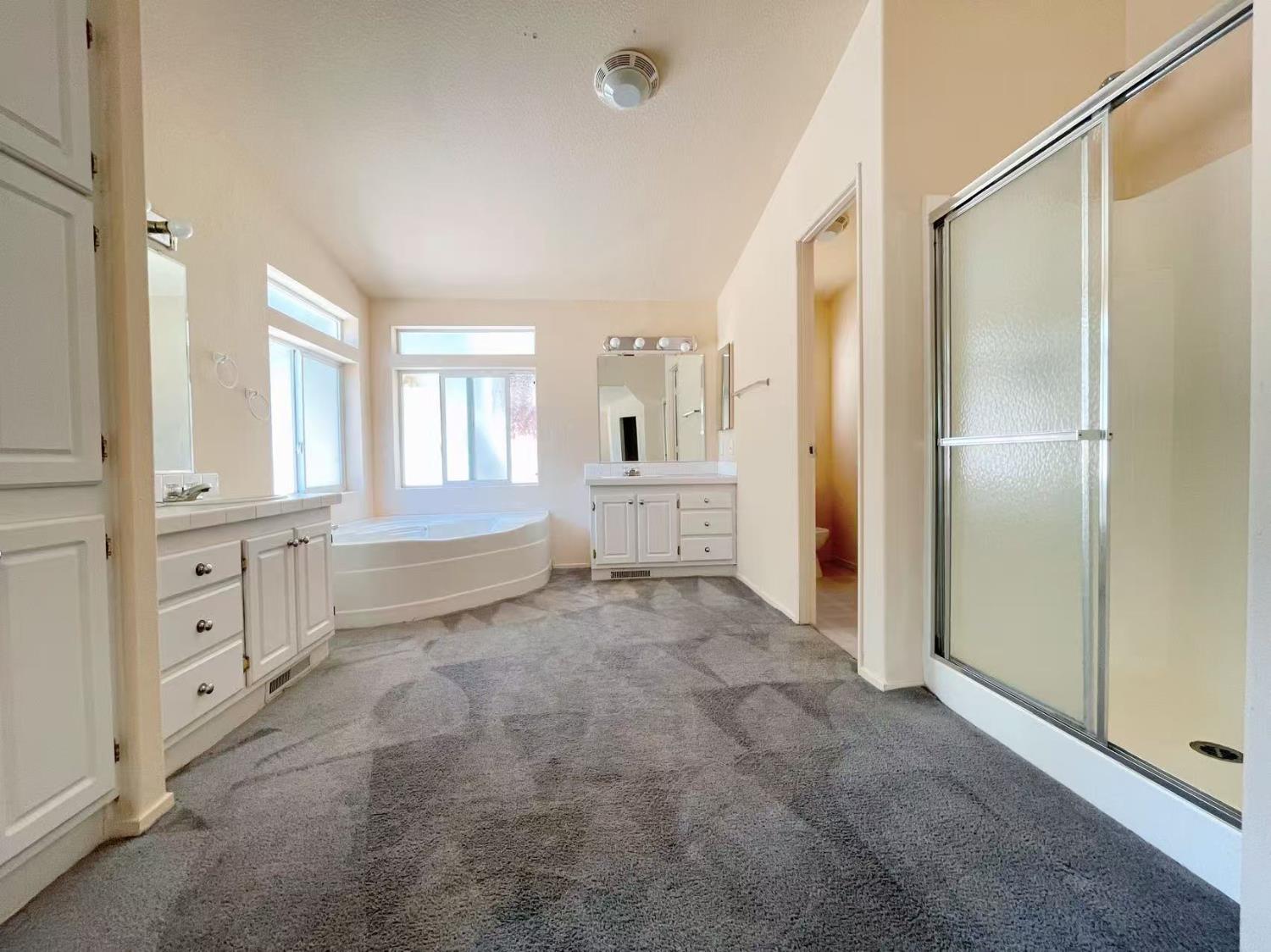 112 Renegade Road Oroville, CA 95966 - Photo 18 of 38 a view of an empty room with window and cabinet area
