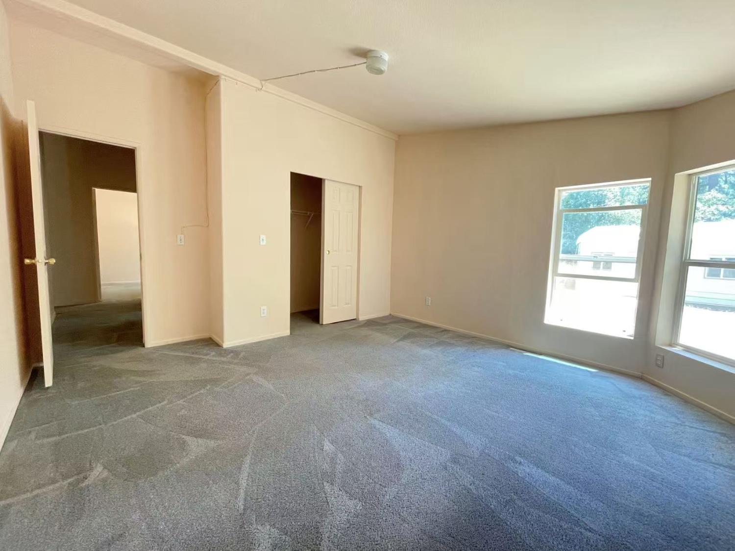 112 Renegade Road Oroville, CA 95966 - Photo 20 of 38 an empty room with windows and closet