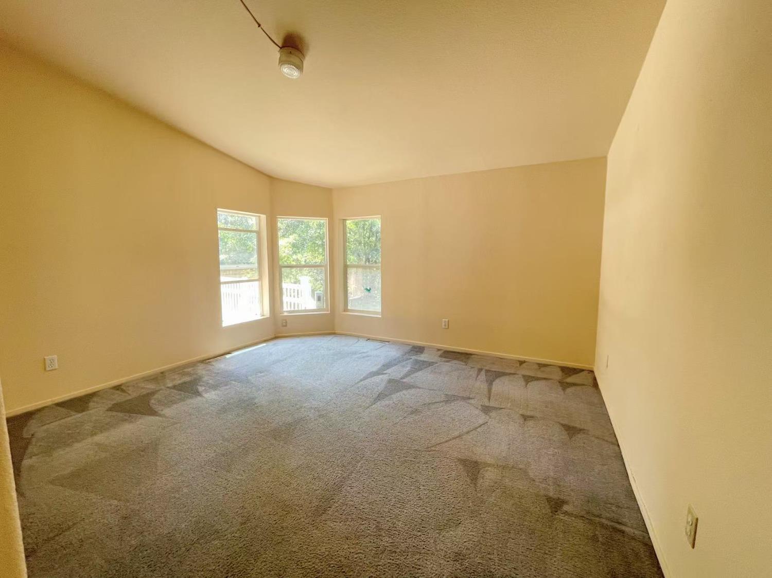 112 Renegade Road Oroville, CA 95966 - Photo 22 of 38 an empty room with windows