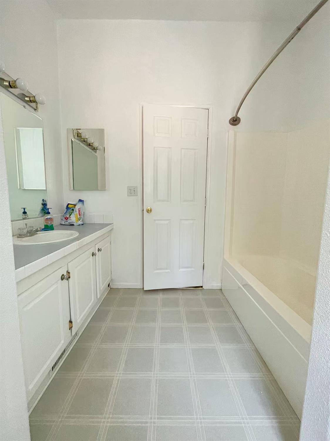 112 Renegade Road Oroville, CA 95966 - Photo 24 of 38 a spacious bathroom with a mirror a double vanity sink a vanity and a shower