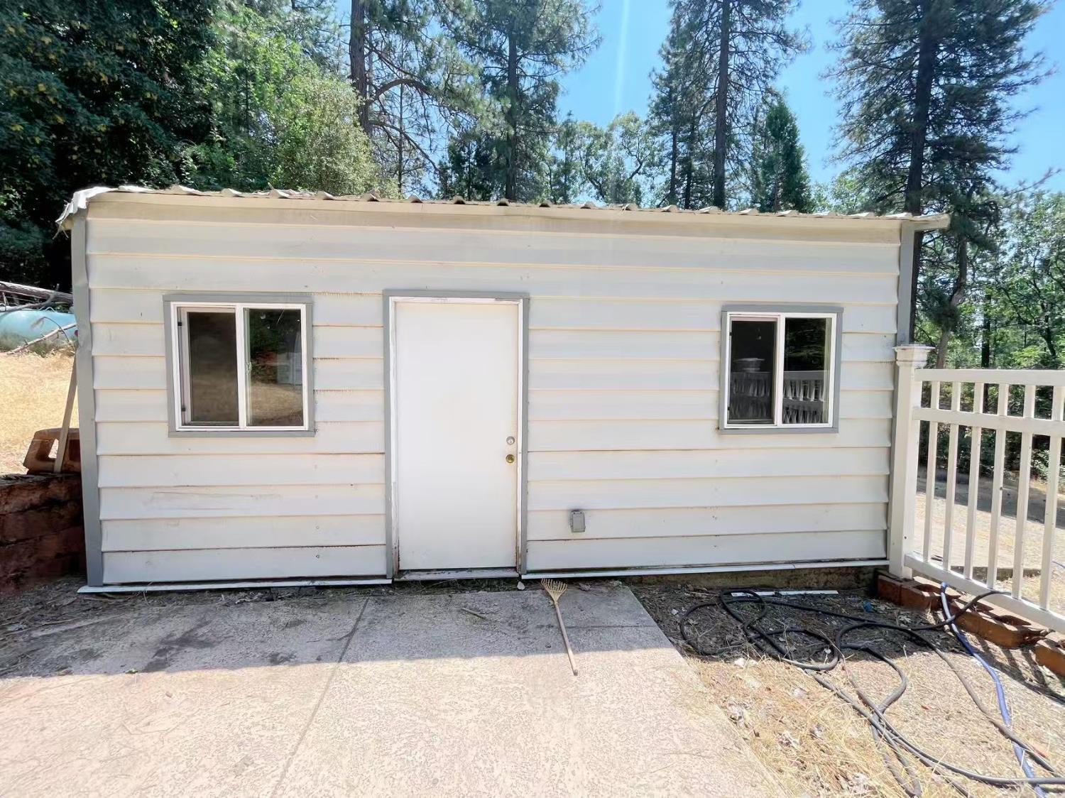 112 Renegade Road Oroville, CA 95966 - Photo 28 of 38 a view of a house with a white door