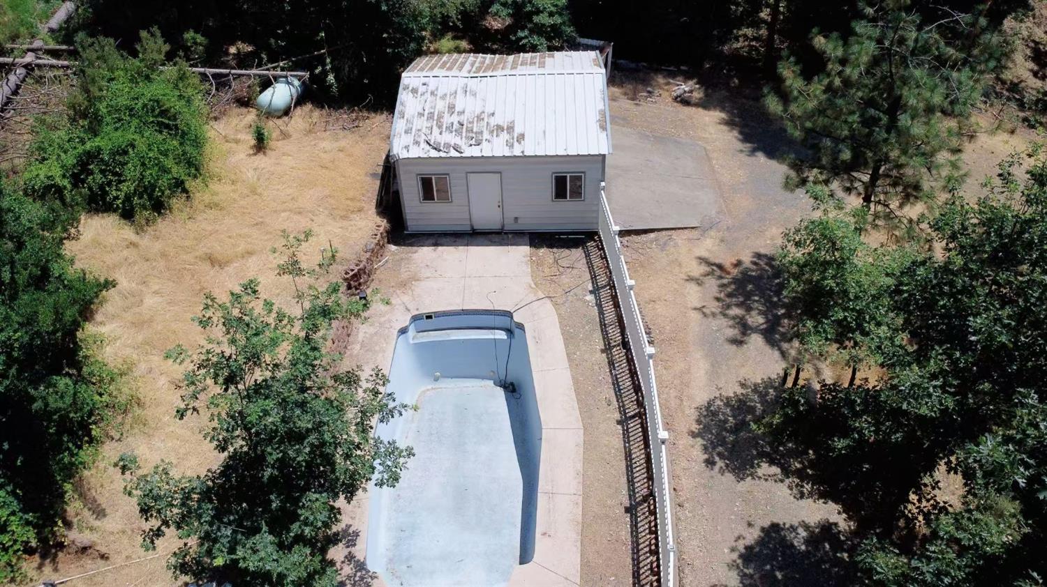 112 Renegade Road Oroville, CA 95966 - Photo 34 of 38 a view of a fireplace in a forest