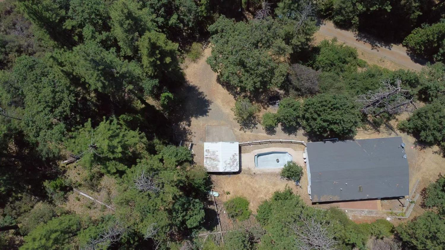 112 Renegade Road Oroville, CA 95966 - Photo 35 of 38 an aerial view of a house with yard and outdoor seating