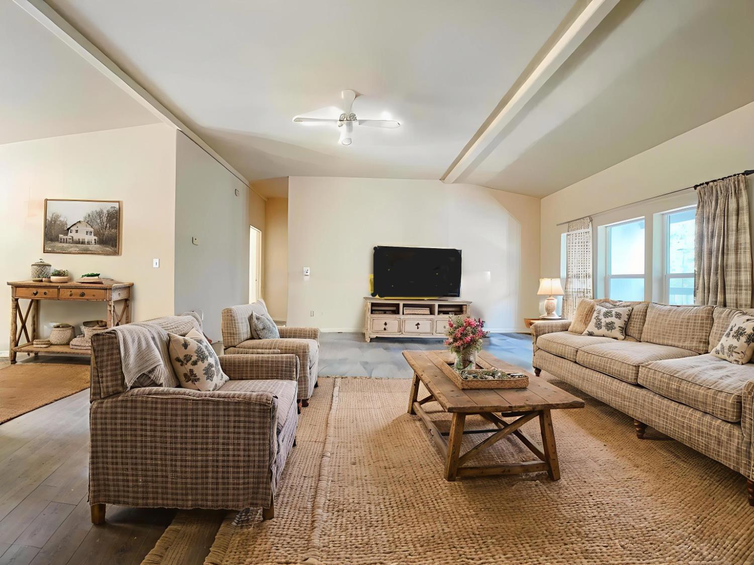 112 Renegade Road Oroville, CA 95966 - Photo 9 of 38 a living room with furniture and a flat screen tv