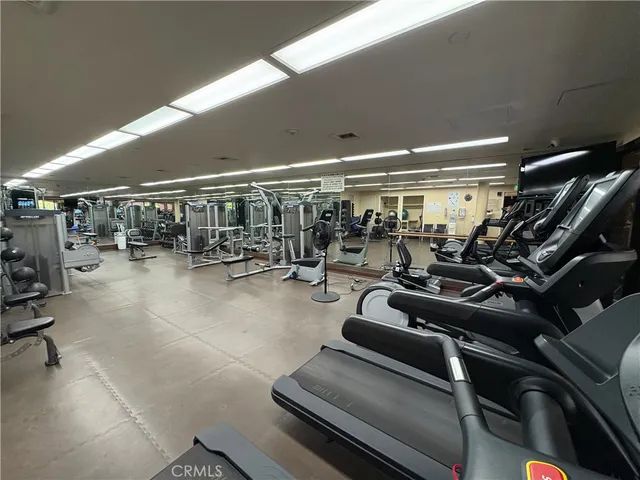 a view of parking garage with cars