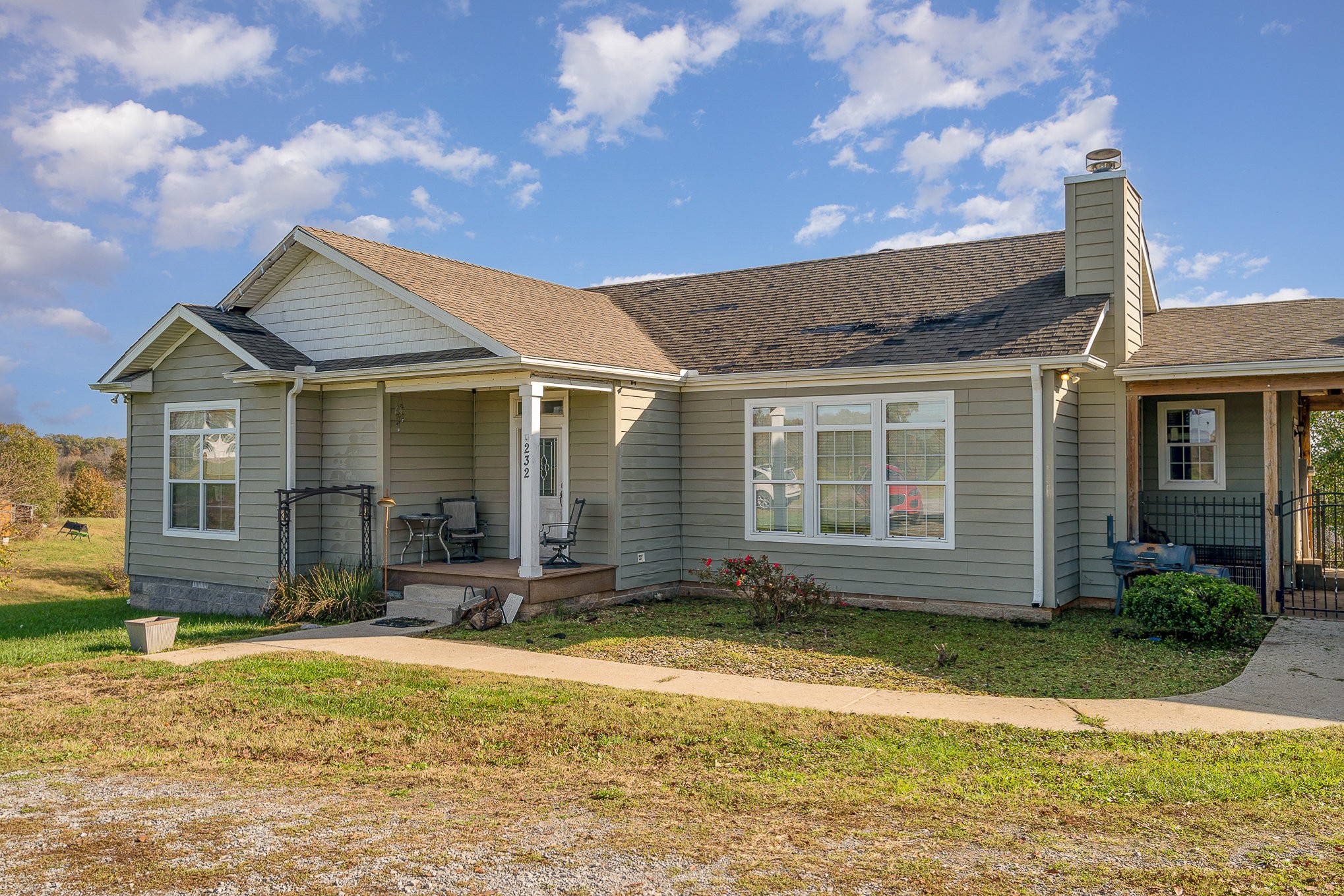 232 Coker Ford Road Portland, TN 37148 - Photo 1 of 49 front view of a house with a yard