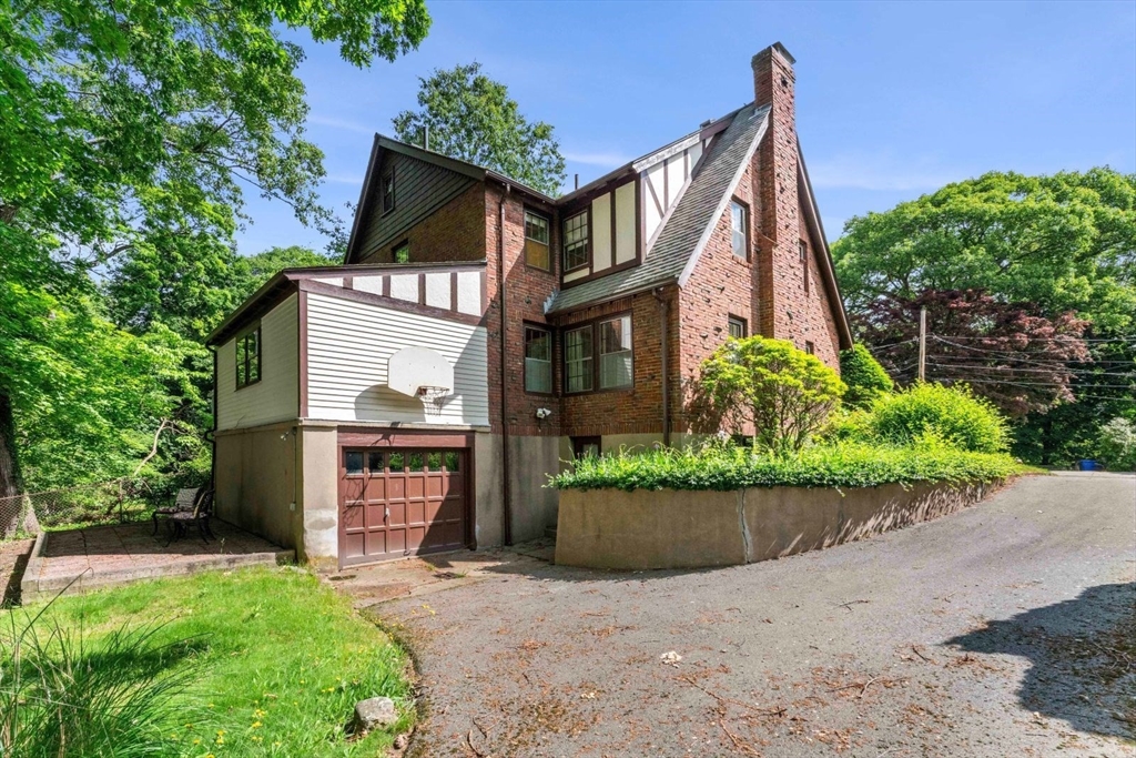 18 Burnside Road Newton, MA 02461 - Photo 22 of 27 a view of a house with a yard