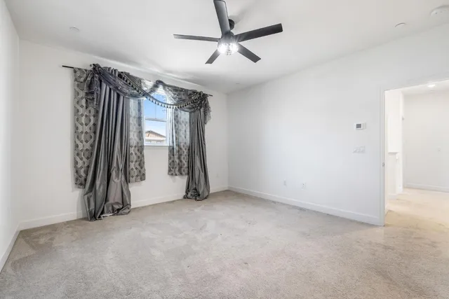 a bathroom with a shower sink and mirror