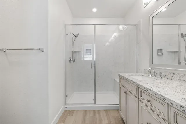 a view of empty room with ceiling fan