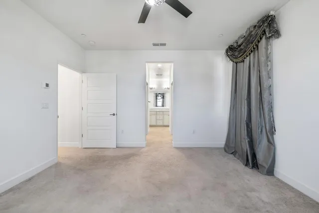 a view of a bathroom with a hardwood floor and a sink