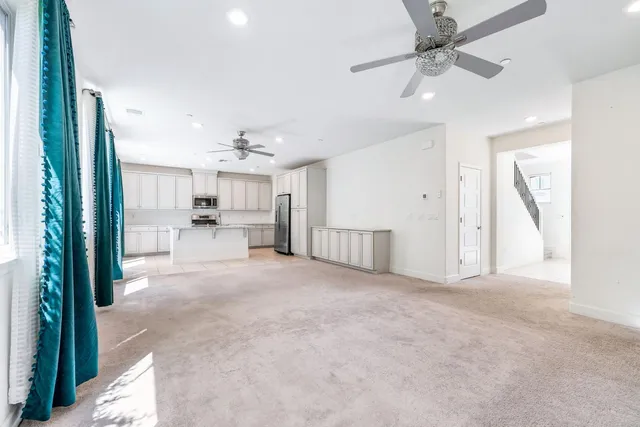 a view of a kitchen with furniture and a kitchen