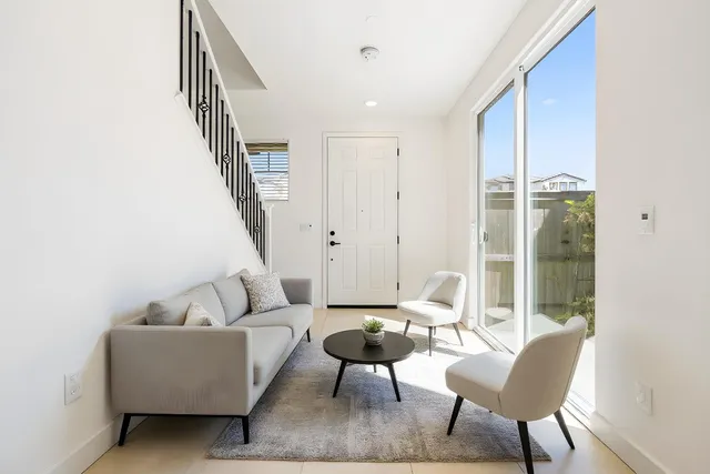 a open kitchen with granite countertop a sink and a stove