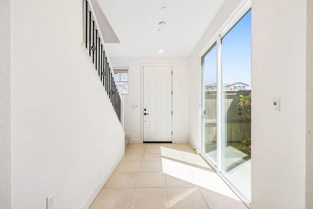 a bathroom with a sink mirror and toilet