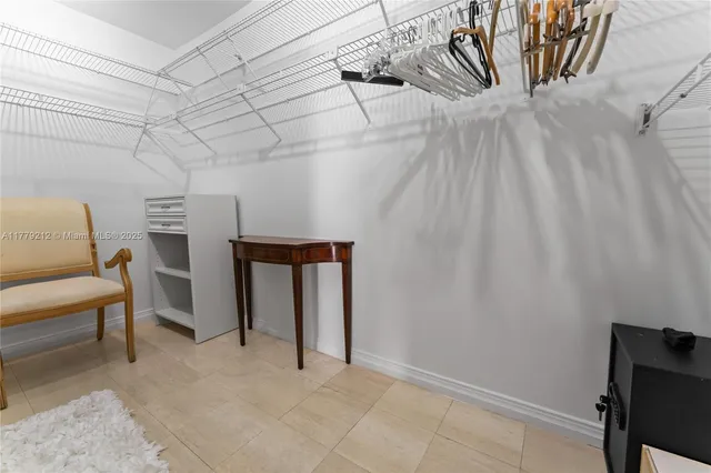 a view of a livingroom with furniture and staircase