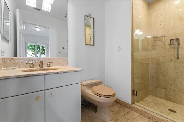 a bed room with a bed and a window