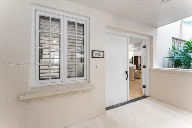 a view of a swimming pool with a yard