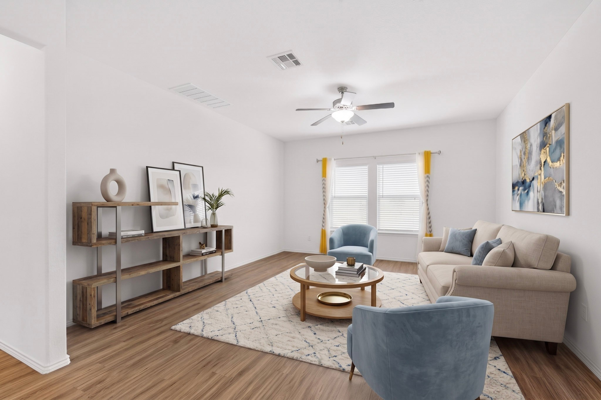 936 Mallow Road Leander, TX 78641 - Photo 7 of 16 Spacious living area featuring wood-finish flooring, white walls, and a ceiling fan with integrated lighting