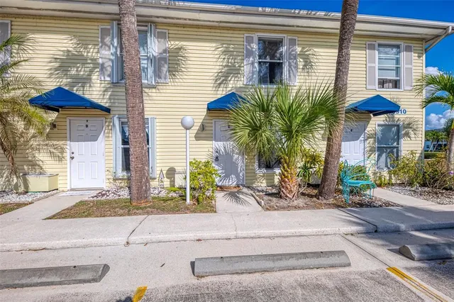 a view of swimming pool with outdoor seating