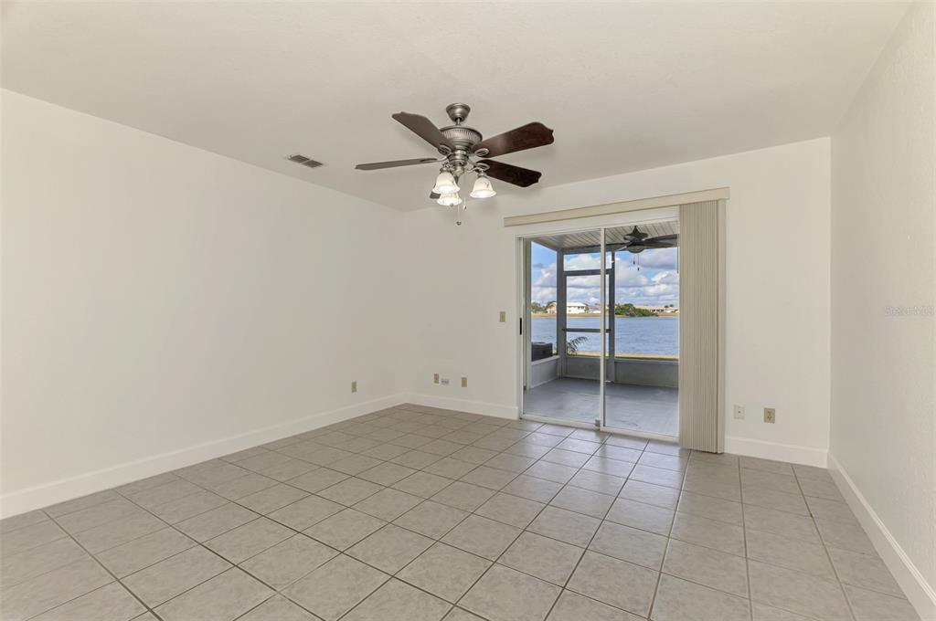 26310 Rampart Boulevard, Unit 505/E Punta Gorda, FL 33983 - Photo 13 of 64 a view of an empty room with a window