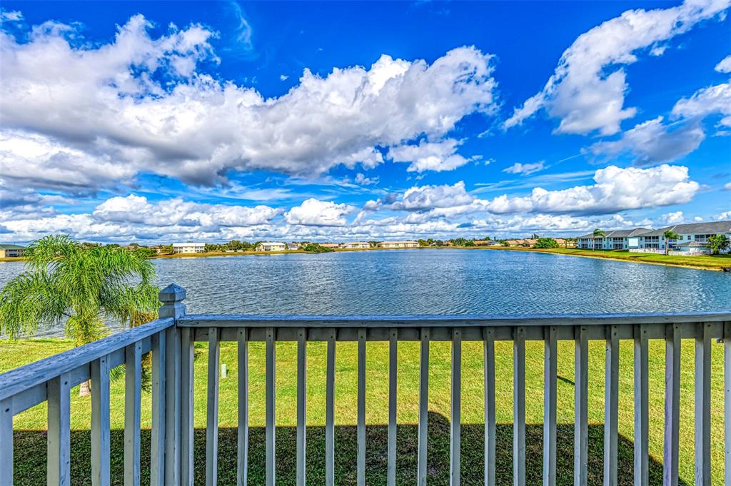 26310 Rampart Boulevard, Unit 505/E Punta Gorda, FL 33983 - Photo 29 of 64 a view of a lake from a balcony