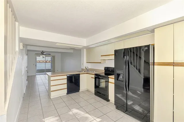 a view of entryway with wooden floor and door