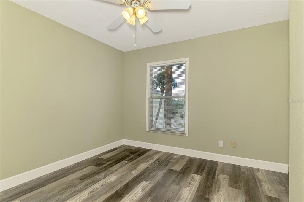 26310 Rampart Boulevard, Unit 505/E Punta Gorda, FL 33983 - Photo 32 of 64 an empty room with a window