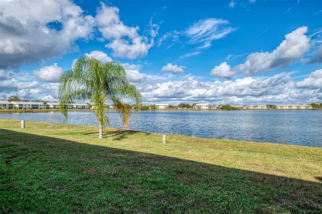 26310 Rampart Boulevard, Unit 505/E Punta Gorda, FL 33983 - Photo 43 of 64 a view of a swimming pool with an ocean view