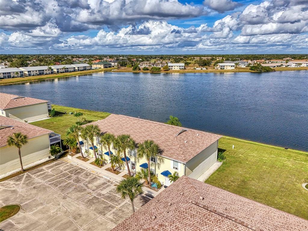 26310 Rampart Boulevard, Unit 505/E Punta Gorda, FL 33983 - Photo 58 of 64 view of a swimming pool with an outdoor seating
