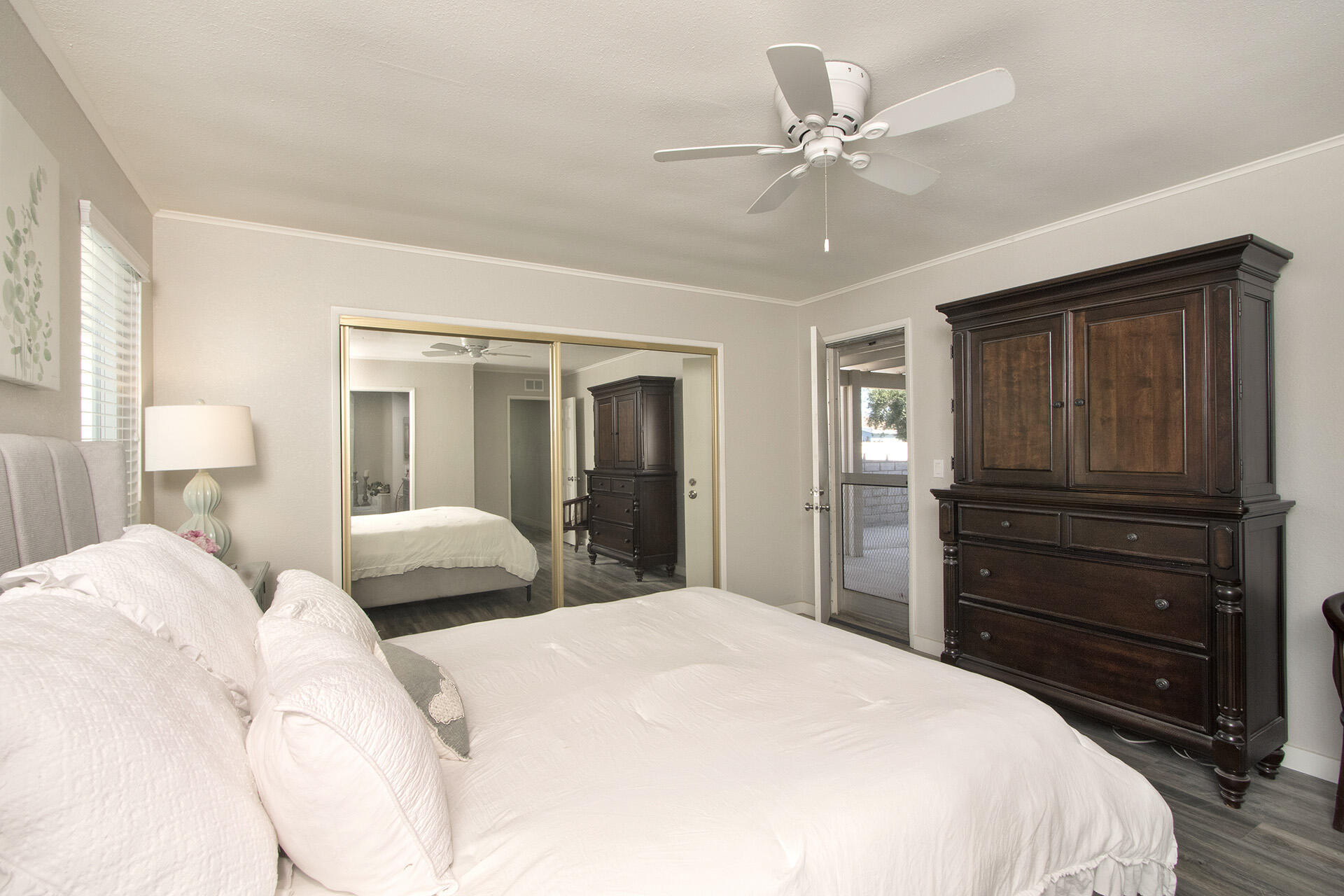 74986 Conestoga Thousand Palms, CA 92276 - Photo 13 of 29 a bedroom with a bed closet and dresser