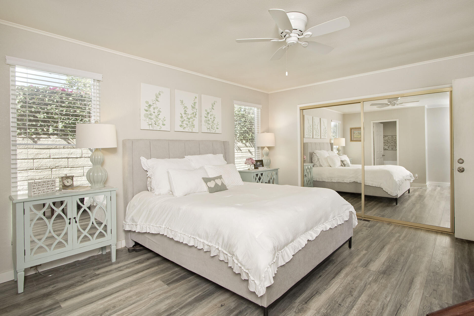 74986 Conestoga Thousand Palms, CA 92276 - Photo 14 of 29 a bedroom with bed and a chandelier