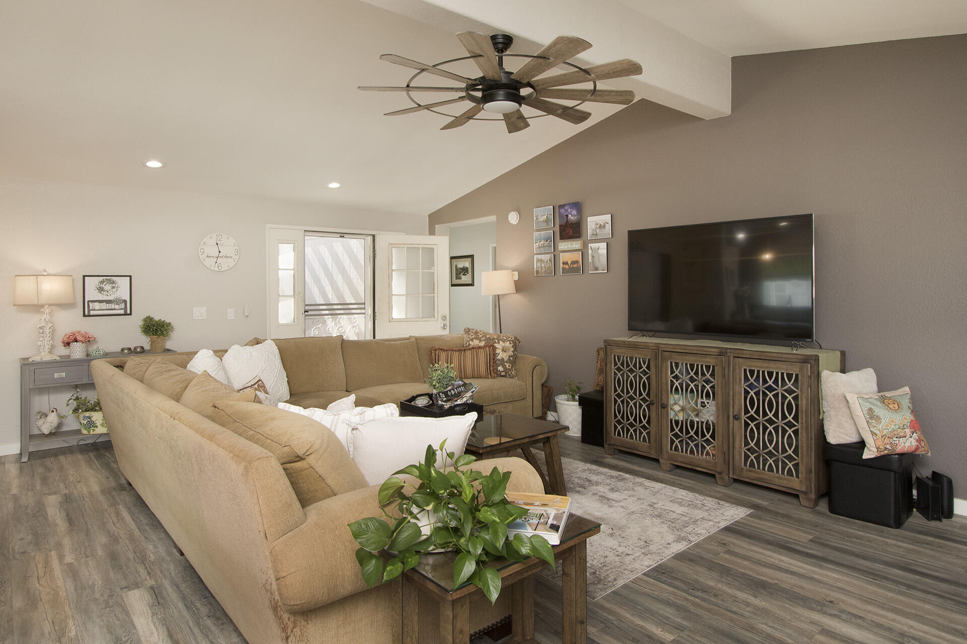 74986 Conestoga Thousand Palms, CA 92276 - Photo 2 of 29 a living room with furniture and a flat screen tv