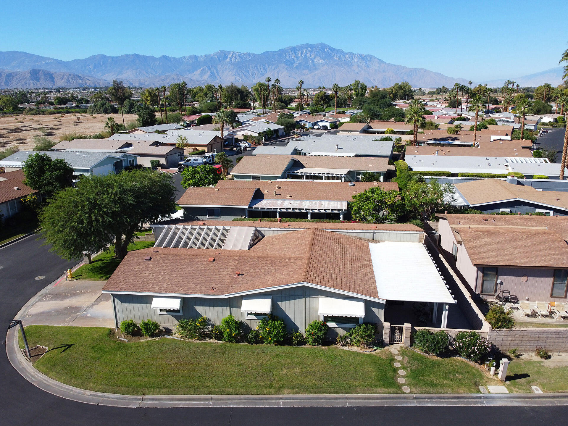 74986 Conestoga Thousand Palms, CA 92276 - Photo 27 of 29 an aerial view of residential houses and outdoor space