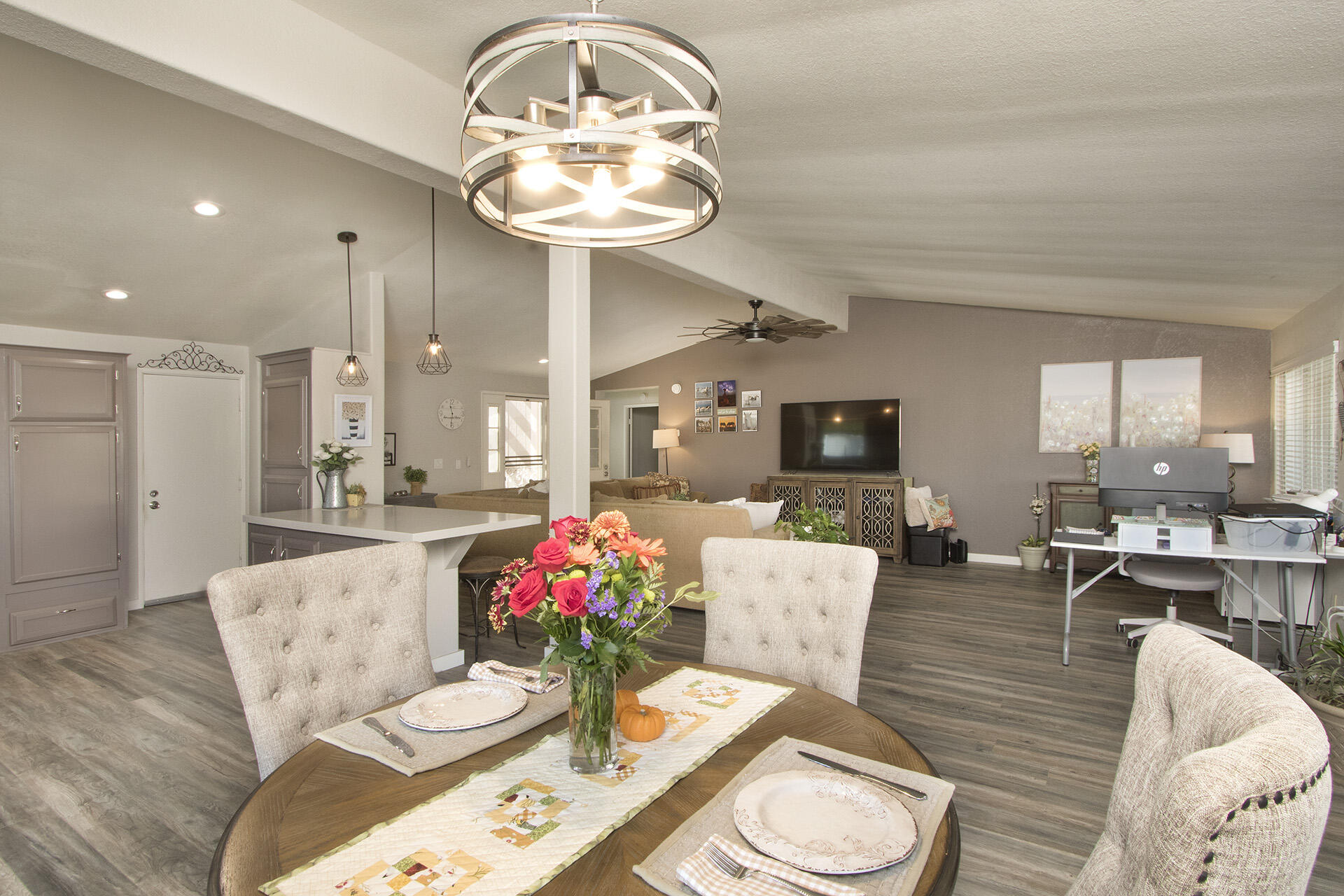 74986 Conestoga Thousand Palms, CA 92276 - Photo 5 of 29 a living room with furniture and a chandelier