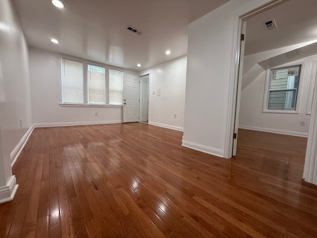 1620 West 44th Street Chicago, IL 60609 - Photo 3 of 37 a view of an empty room with wooden floor and a window