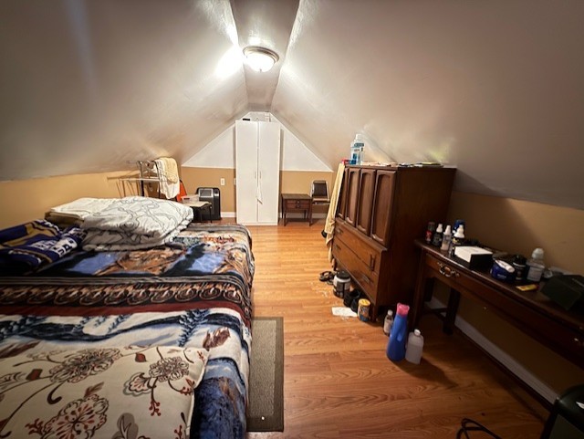 1620 West 44th Street Chicago, IL 60609 - Photo 31 of 37 a bedroom with bed and mirror