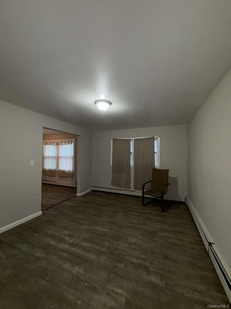 27 Panamoka Trail Ridge, NY 11961 - Photo 7 of 9 an empty room with windows